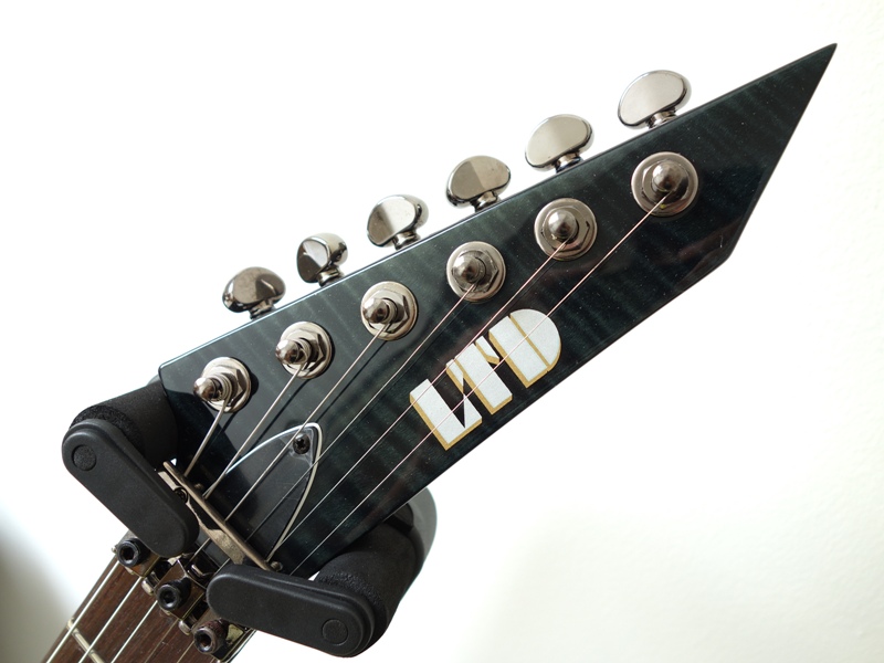 esp-ltd-ex-401dx-electric-guitar-see-thru-black-front-headstock.JPG